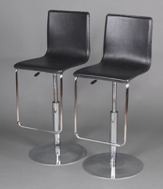 A pair of chrome and black rexine revolving kitchen/bar stools 100cm x 39cm x 40cm 