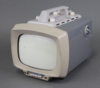 A 12" mains battery Perdio portable television contained in a grey plastic case (the first ever mains battery portable television) 