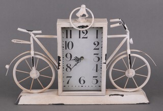 A quartz mantel clock with rectangular painted dial and Roman numerals, the metal case in the form of a bicycle 30cm x 45cm x 8cm 