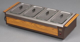 An Ekco hostess hot plate fitted 4 dishes 17cm x 72cm x 28cm 
