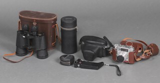 A pair of CBC 10x50 binoculars cased, a Pentax Asahi sportsmatic camera with Super-Multi-Coated lens, a Braun Paxette camera and a Hanimex Tele-Auto lens 1:3.5 lens 