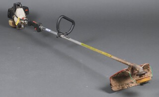 A Stihl FS66 petrol strimmer