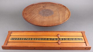 A snooker score board 20cm x 69cm,  an Eastern carved hardwood lazy Susan 48cm diam. and a commemorative oar 