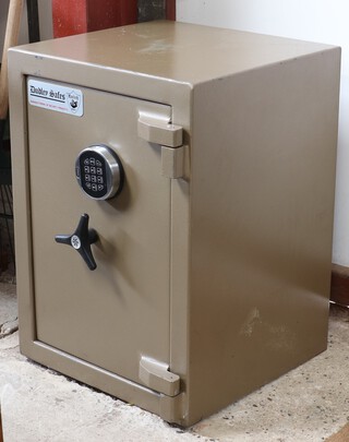 A Dudley safe complete with key 64cm h x 46cm w x 44cm d (the key and the combination to the safe are in an envelope in the office)