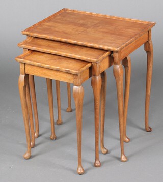 A nest of 3 rectangular bleached mahogany coffee tables, raised on cabriole supports 55cm h x 50cm w x 37cm d 