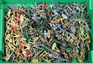 Britains Toys, a large collection of plastic army soldiers and several die cast field guns 