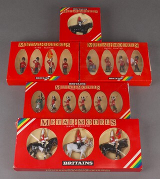 Five Britains metal models - Life Guards, Royal Horse Guards, Scots Guards Farriers (x2) and Gordon Highlanders, all boxed 