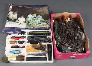 A Lima double headed diesel locomotive together with items of rolling stock and track 