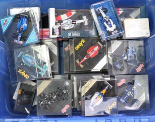 Sixteen Quartzo models of Formula One racing cars, 4 Minichamps models of racing cars, 4 Onyx model racing cars and 10 other model racing cars, all contained in a blue plastic box 