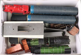 A Triang Dublo gauge diesel locomotive, small quantity of rolling stock and a plastic model platform 