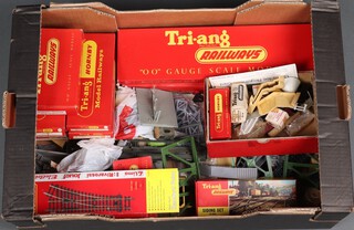 A quantity of Triang OO gauge buildings and bridges, etc, contained in a fruit box 