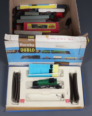 A Hornby Dublo  O Gauge train set, boxed and a collection of rolling stock, OO diesel locomotive and carriages, all contained in a cardboard box 
