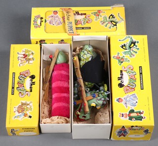 Three Pelham puppets - caterpillar, queen and mother dragon 