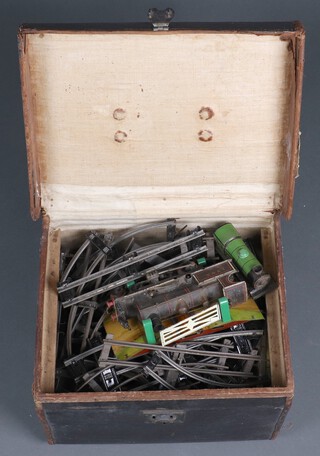 A O gauge locomotive marked L.N.W.R and a quantity of rails including level crossing, contained in a fibre case 