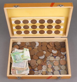A quantity of world coins and bank notes 