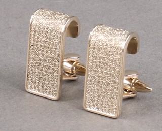 A pair of mid-century gilt cufflinks 