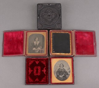 Three Victorian portrait ambrotypes and a case 