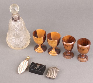An Edwardian silver plated vesta and other curios 