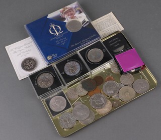 A collection of commemorative crowns and coins 