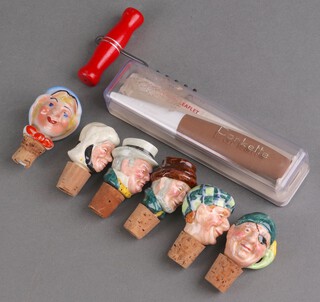Six ceramic bottle stoppers in the form of a Dickensian characters and other curios 