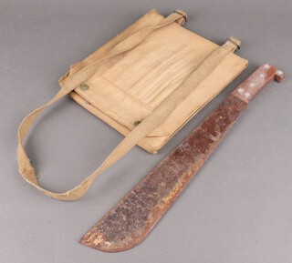 A machette in a webbing carrier 