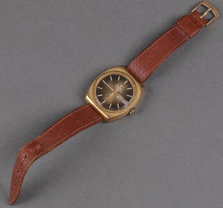 A gentleman's gilt cased vintage Bulova Accutron day date wristwatch on a leather strap