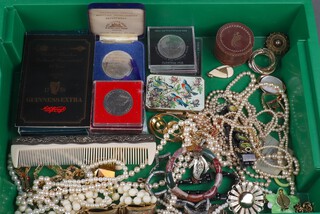 A quantity of costume jewellery and coins 