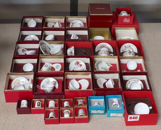 A collection of miniature porcelain tea ware, thimbles, plates etc