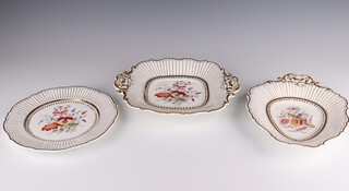 A 19th Century Rockingham style 21 piece floral patterned fruit service with gilt banding comprising 2 square dishes (both cracked), 3 heart shaped dishes (2 cracked), oval dish (cracked), 15 plates (1 cracked) 1/335 