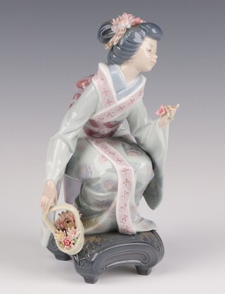 A Lladro figure Flower Gatherer 20cm
