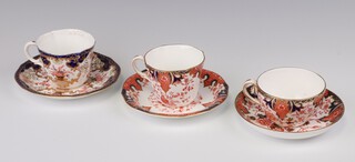 A Royal Crown Derby Imari pattern  cup and saucer 2712 2 (cup cracked), ditto 3788 11 and a 19th Century Royal Crown Derby Imari pattern cup and saucer with cypher mark (cup cracked) 