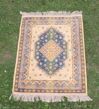 An orange and blue ground Belgian cotton machine made Persian rug with central medallion 103cm x 70cm 