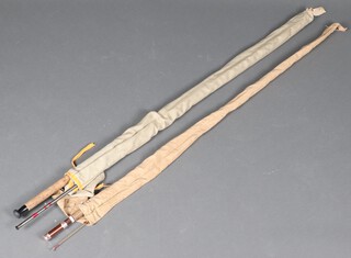 A Milbro Trufly 2 section fibre glass fishing rod, ditto 2 section carbon fibre fly fishing rod, a Greenheart 4 section fishing rod and 2 others