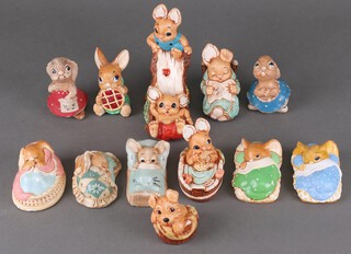 A collection of 12 Pendelfin figures 