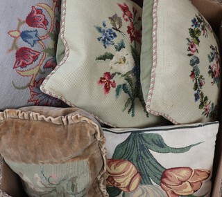 A collection of Berlin wool work and other decorative cushions 