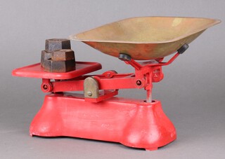 A set of Faraday red painted iron kitchen scales with brass pan and iron weights 