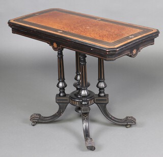 James Winter and Sons, 151, 153, 155 Wardour Street, So Ho London, a Victorian quarter veneered figured walnut and ebonised card table, raised on 4 turned columns with splayed feet 71cm h x 96cm w x 48cm d 