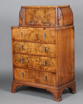 An Art Deco figured walnut chest, the upper section with cupboard with fall front above 4 drawers, raised on splayed bracket feet 135cm h x 84cm w x 48cm d 