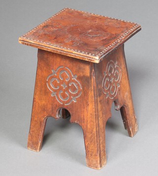 Liberty & Co, an Arts and Crafts Moorish oak stool with embossed leather seat  41cm h x 30cm x 30cm 
