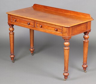 A Victorian mahogany wash stand/writing table with raised back, fitted 2 drawers, raised on turned supports 73cm h x 106cm w x 50cm d 