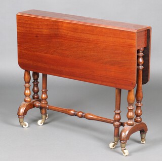 A Victorian mahogany Sutherland table on turned supports with ceramic casters 73cm h x 86cm w x 17cm d 