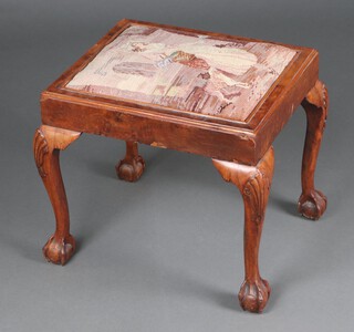 A rectangular Queen Anne style walnut stool with Berlin wool work upholstered drop in seat, raised on carved cabriole, ball and claw supports 46cm h x 49cm w x 40cm d 