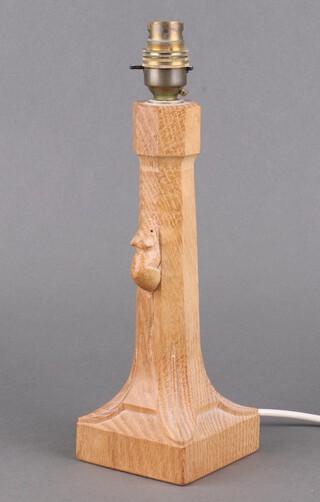 Robert "Mouseman" Thompson of Kilburn, a carved English oak octagonal table lamp with carved mouse, on a square base, 26.5cm h x 9cm x 10cm 
