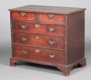 An 18th Century oak chest of 2 short and 3 long drawers with brass swan neck drop handles 84cm h x 96cm w x 52cm d 