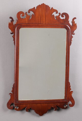 A Chippendale style rectangular plate mirror contained in a mahogany frame 70cm x 44cm 