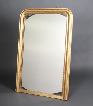A 19th Century Continental arch shaped over mantel mirror contained in a gilt plaster and ball studded frame 137cm x 90cm 
