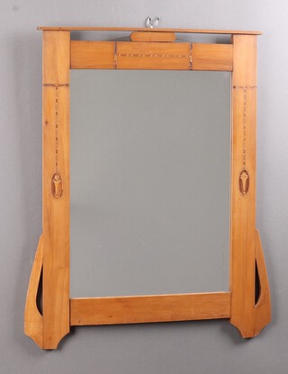 An Art Nouveau Continental rectangular plate mirror contained in an inlaid and pierced mahogany frame 81cm x 65cm 