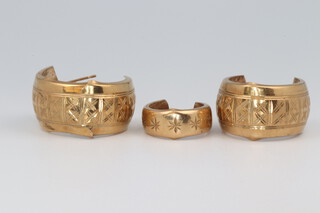 A pair of 9ct yellow gold half hoop earrings and a single ditto, (all bent) 4.3 grams 