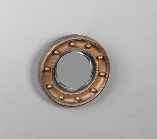 A 1920's circular Regency style convex plate wall mirror contained in a gilt wood and plaster frame 24cm 