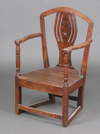 An 18th Century oak slat back open arm chair with solid seat, raised on square supports with box framed stretcher 88cm h x 52cm w x 40cm d 